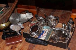 Box with silver plated wares, five board games, kitchen scales, food slicer, and camera tripod.