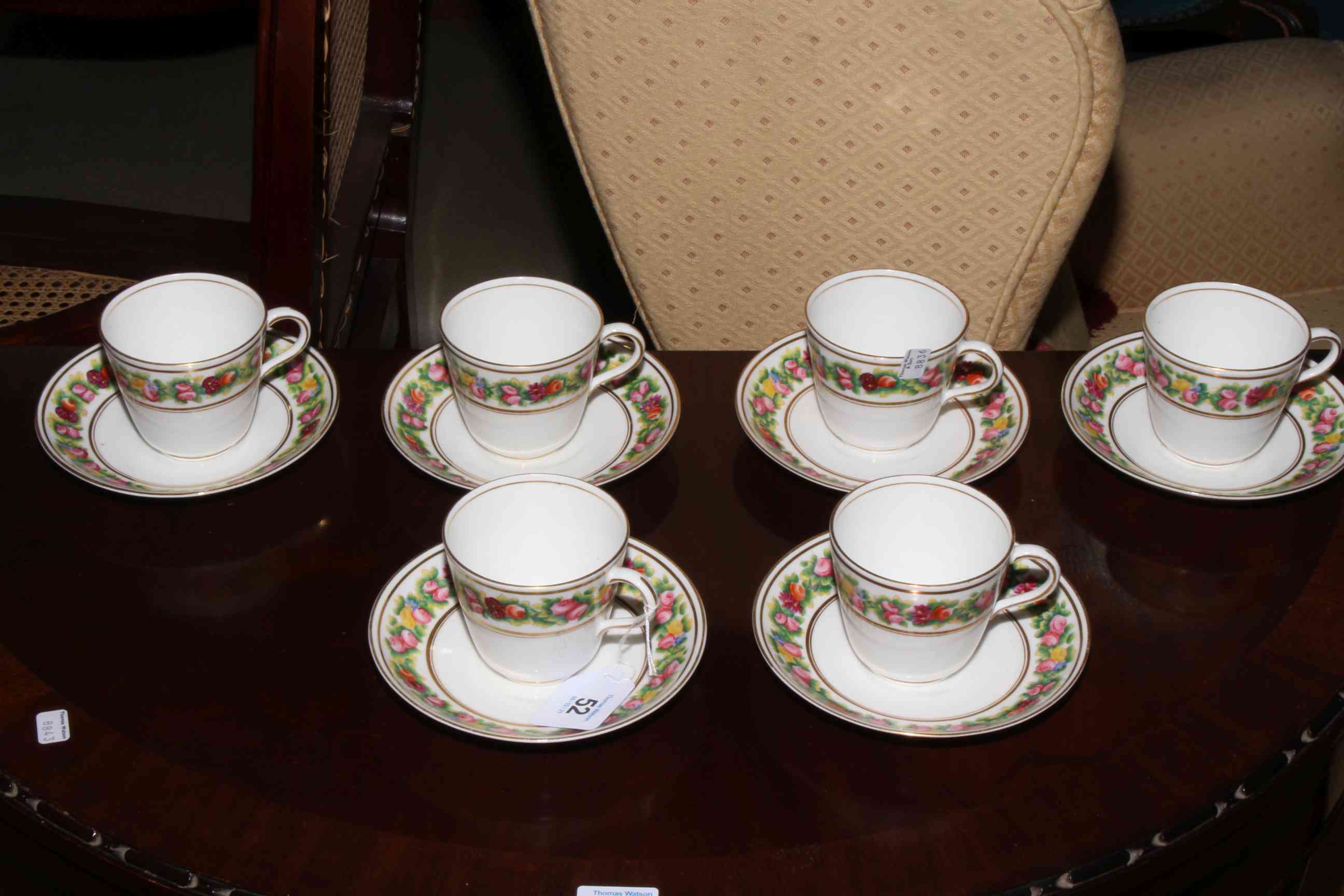 Set of six Continental flower painted cups and saucers. Condition: All Good.