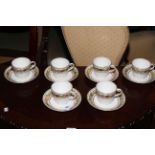 Set of six Continental flower painted cups and saucers. Condition: All Good.
