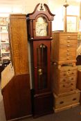 Modern mahogany effect triple weight longcase clock, signed PR Westminster Germany, 212cm high.