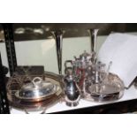 Good collection of silver plated ware including trays, tea services, two toast racks, etc.