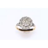 18 carat gold and 21 stone diamond cluster ring, size N.