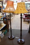 Small standing ebonised corner cabinet, two standard lamps with shades, and three mirrors (6).