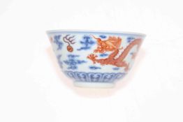 Chinese porcelain bowl with iron red dragons and blue and white decoration, six character mark,