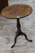 19th Century mahogany snap top tripod table with turned column and pad feet.