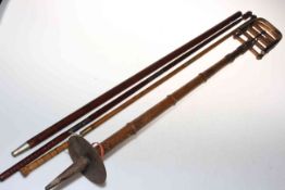 Cane shooting stick, two gun barrel cleaning rods and spike handled stick.