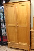 Modern oak four piece bedroom suite comprising double door wardrobe,