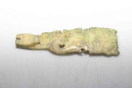 Carved jade belt buckle, 11.5cm length.