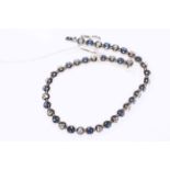 Sapphire and diamond bracelet set in 18 carat white gold, having 39 alternating stones, 17cm length.