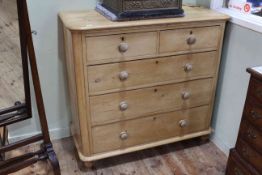 Victorian pine four height chest on turned legs, 110cm wide, 105cm high, 52cm deep.