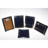 Collection of five silver mounted rectangular photograph frames,