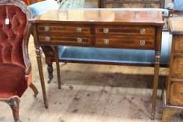 Reproduction mahogany and satinwood inlaid four drawer console table having rounded corners and