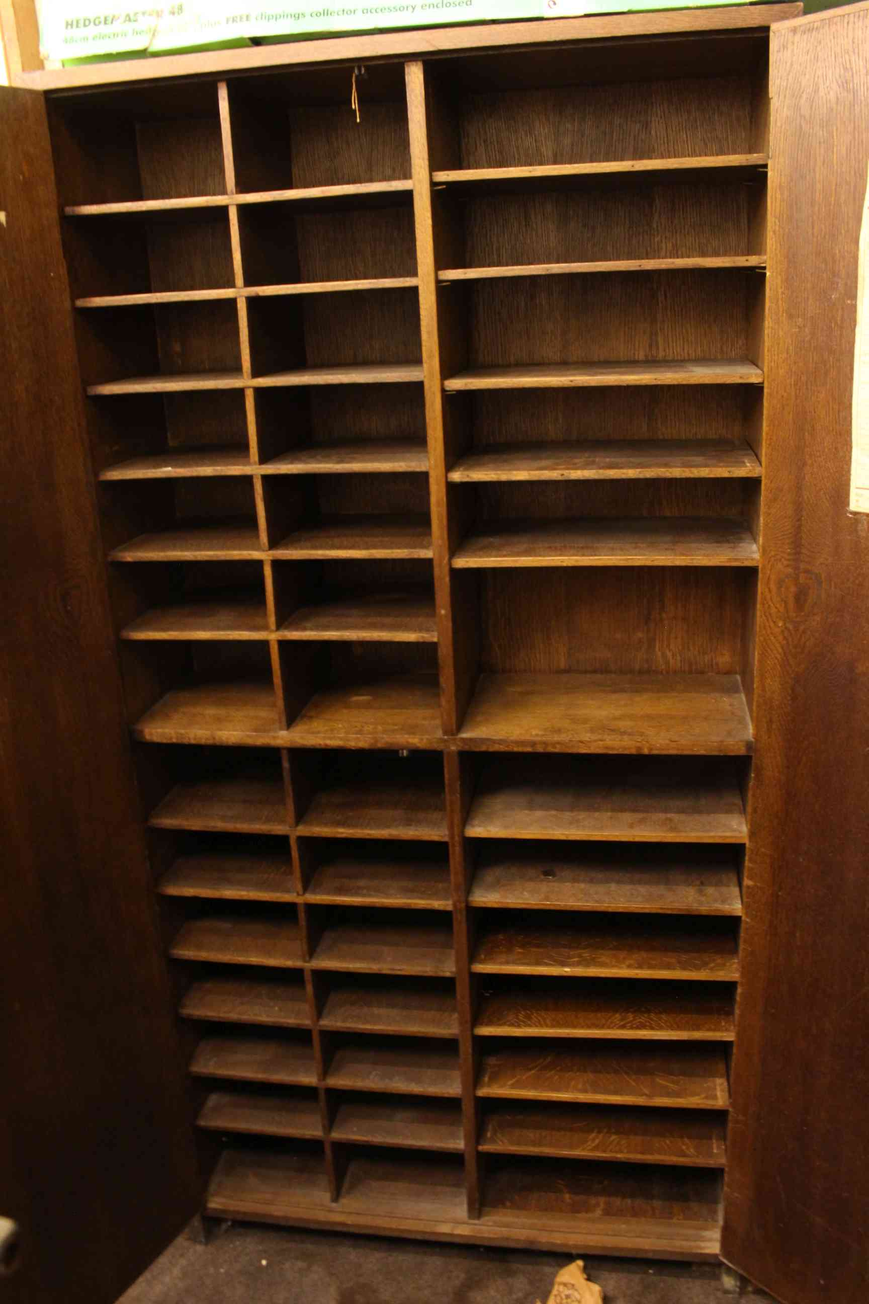 Mid 20th Century oak Post Office two door sorting cupboard fitted with compartments. - Image 2 of 3
