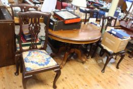 Victorian oval mahogany breakfast table in five turned pillars to four scrolled legs,