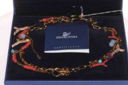 Swarovski 'coral and crystal' necklace, boxed.