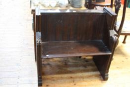 Victorian stained oak church pew, 84cm by 91cm by 46cm. Condition: Slightly loose in joints.