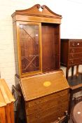 Edwardian mahogany and shell inlaid bureau bookcase having swan neck pediment and two astragal