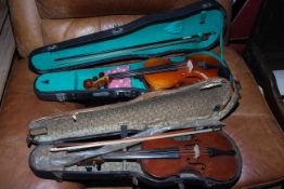 Two cased violins with bows (one 3/4 size). Condition: 3/4 violin in fairly poor condition.