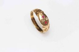 18 carat gold ruby and diamond gypsy set ring, Birmingham 1906, size P/Q.