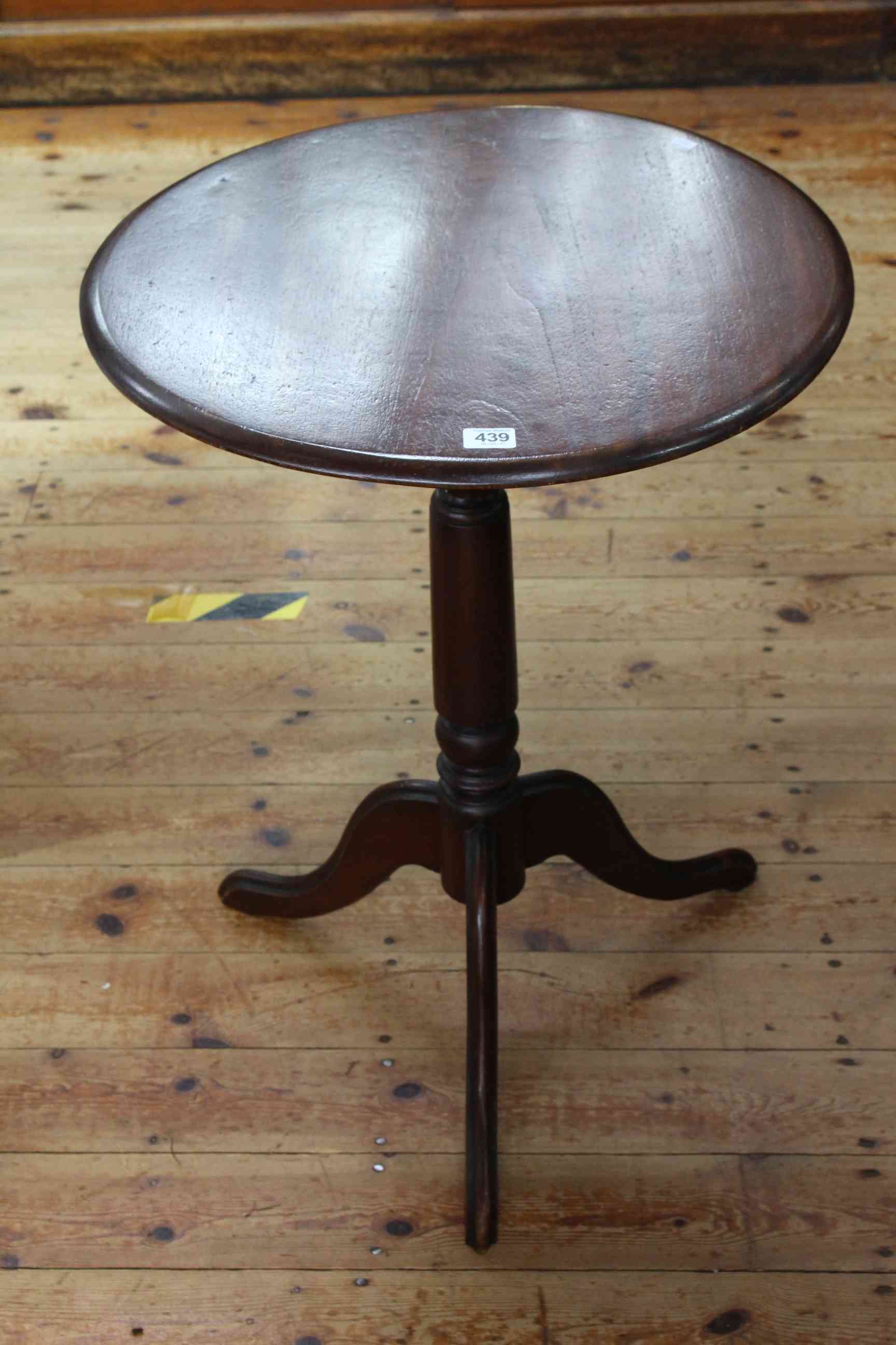 19th Century mahogany circular tripod occasional table, 70cm by 52cm diameter.