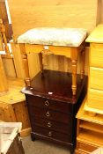 Stag Minstrel four drawer pedestal chest, pine dressing stool,