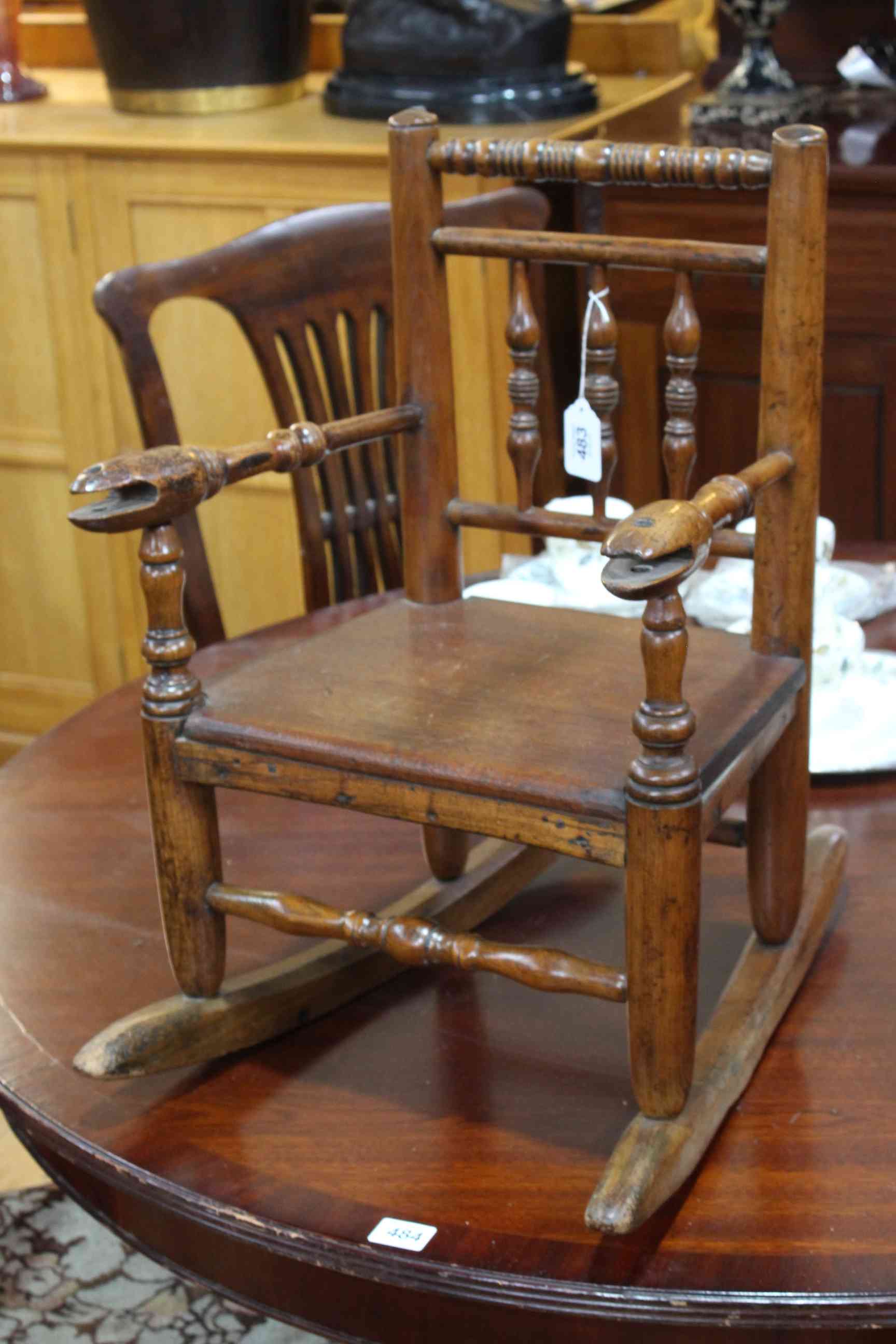 19th Century child's country rocking chair.