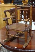 19th Century child's country rocking chair.