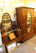 Edwardian inland mahogany oval mirror door wardrobe and dressing table.