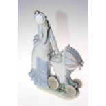Lladro 'Baby's Outing', 32cm. Condition: Good.