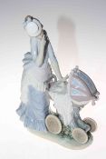 Lladro 'Baby's Outing', 32cm. Condition: Good.