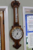 Carved oak aneroid barometer and thermometer, 86cm height.