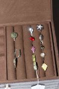 Collection of ten silver mostly gem set tings and en-suite pendant and earrings (12),