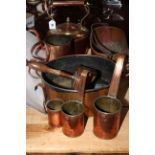 Vintage copper kitchenalia comprising three 'Mill Farm' measures, Arts and Crafts measure, kettle,