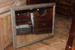 Rectangular silvered framed bevelled wall mirror, 92cm by 117cm overall.