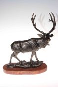 Bronzed model of stag on a wooden plinth, 47cm high.