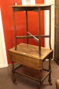 Two similar oak drop leaf trolleys and two oak occasional tables (4).
