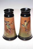 Pair large Bretby vases with birds and blossom on shaded ground, 32cm.