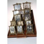 Collection of thirteen ornate cast brass easel photograph frames, largest 23cm by 16cm.