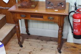 Late 19th/early 20th Century walnut single drawer side table in turned legs, 75cm by 92cm by 50cm.
