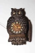 Paico tinplate owl wall clock, 20cm height.