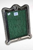 Silver mounted easel photograph frame, hallmarked Chester 1908, overall 28.5cm by 22.5cm.