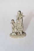 Japanese ivory Okimono of man and boy, 12cm; together with opera glasses, monocular, letter knife,