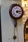 Victorian double weight post office wall clock with enamelled dial, 27cm diameter.