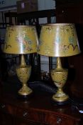 Pair of as new 'Japanned' yellow table lamps with shades, 78cm high.