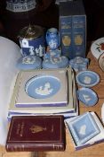 Collection of Wedgwood Jasperware including biscuit jar, and three volumes on Josiah Wedgwood.