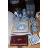 Collection of Wedgwood Jasperware including biscuit jar, and three volumes on Josiah Wedgwood.