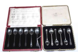 Cased set of silver teaspoons with six different assay hallmarks and cased set with bright cut
