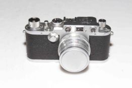 Leica 35mm shark skin camera, 2/50 lens. CONDITION - Yes in working order.
