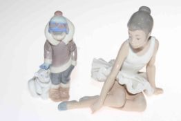 Lladro Eskimo boy with bear cub, 15cm, and Nao ballerina resting. Condition: Both Good.