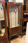 1920's mahogany single door vitrine on ball and claw legs, 171cm high, 67cm wide, 34cm deep.